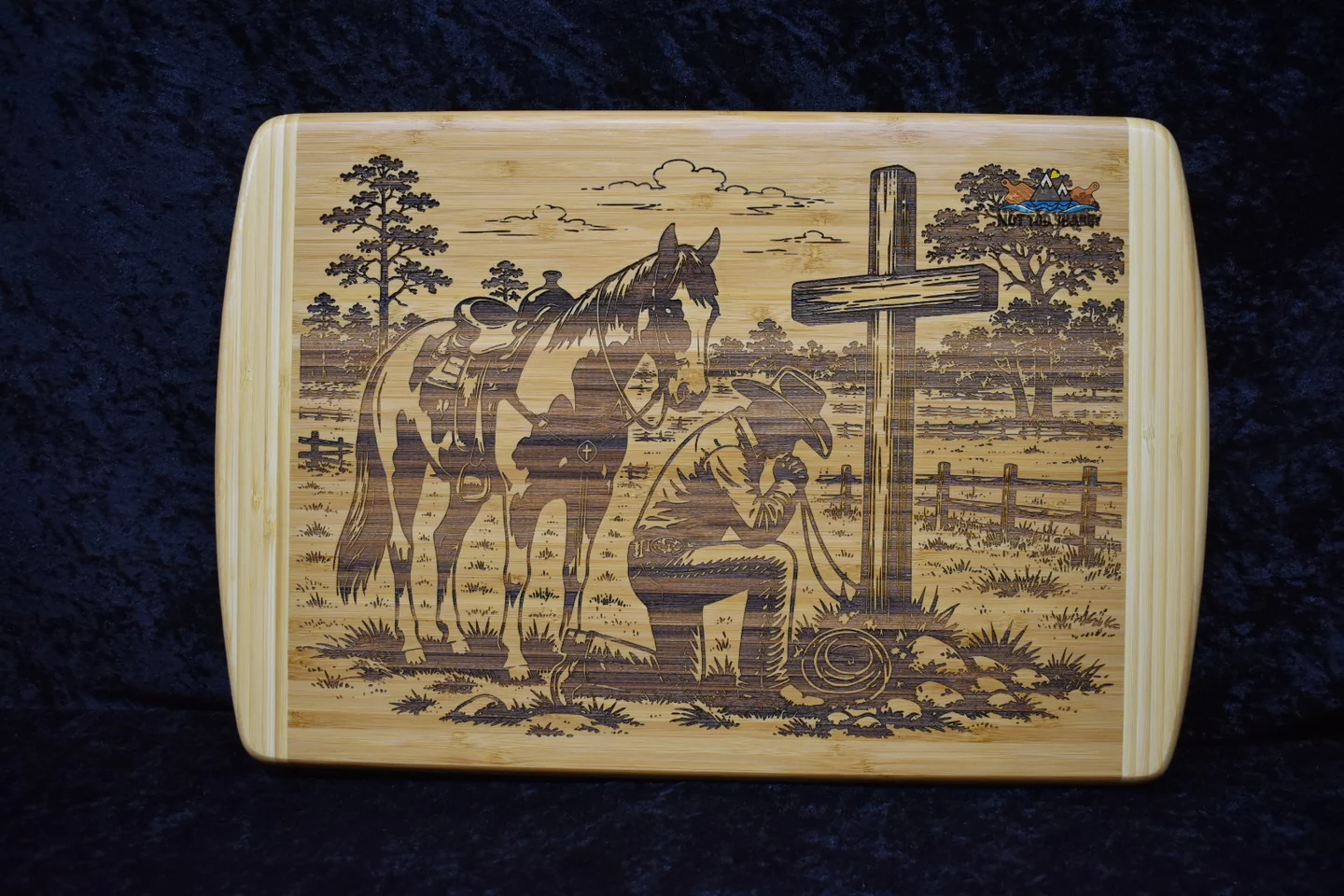 Kneeling Cowboy by the Pasture engraved board