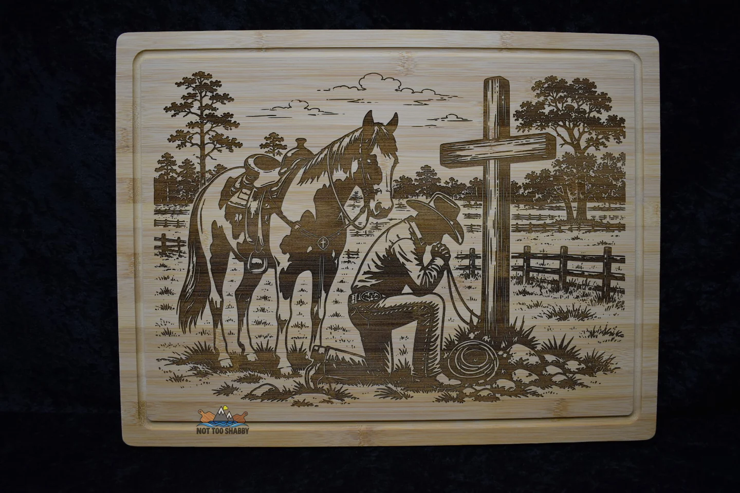 Kneeling Cowboy by the Pasture engraved board