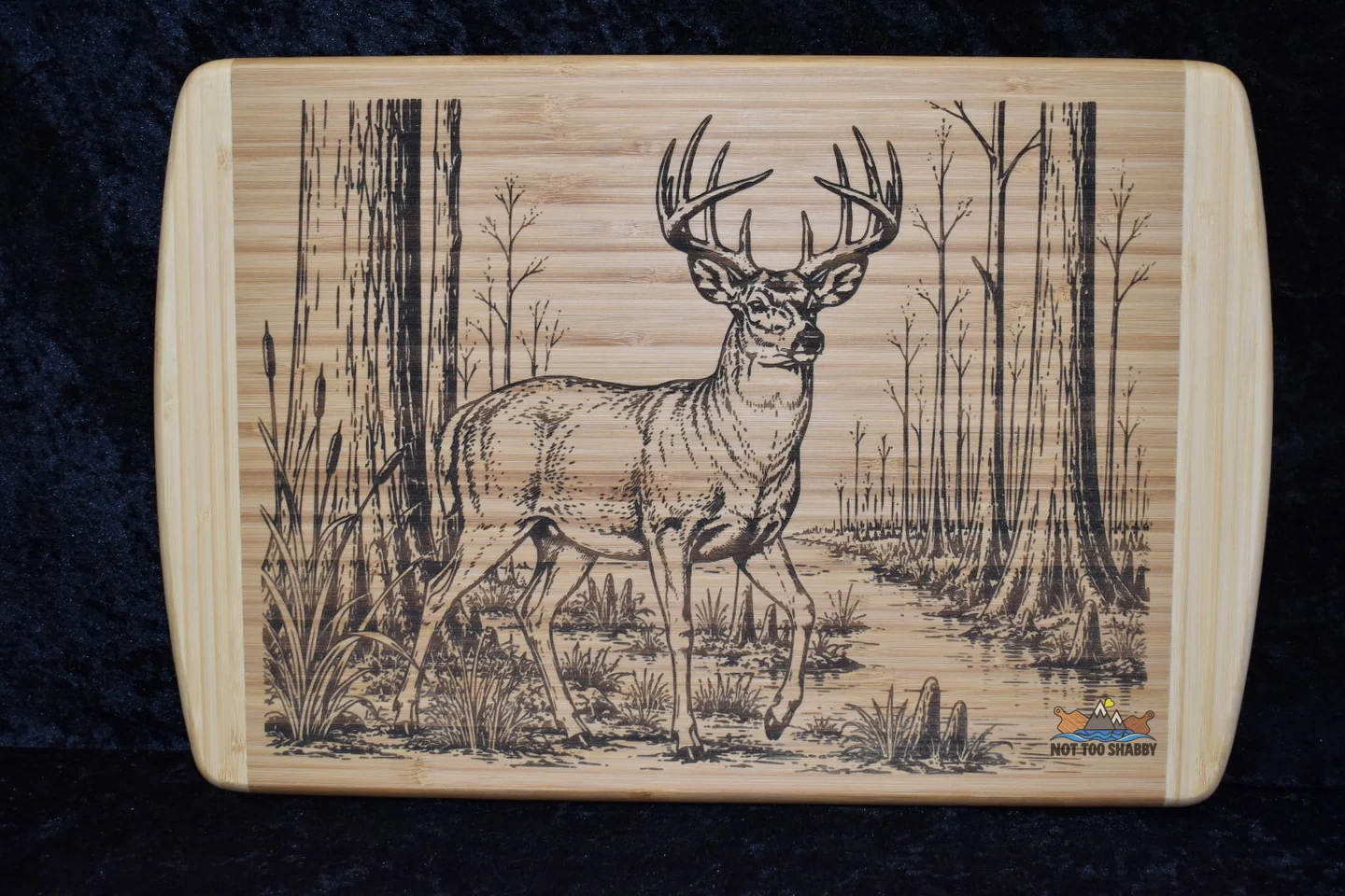 Engraved deer scene on a cutting board