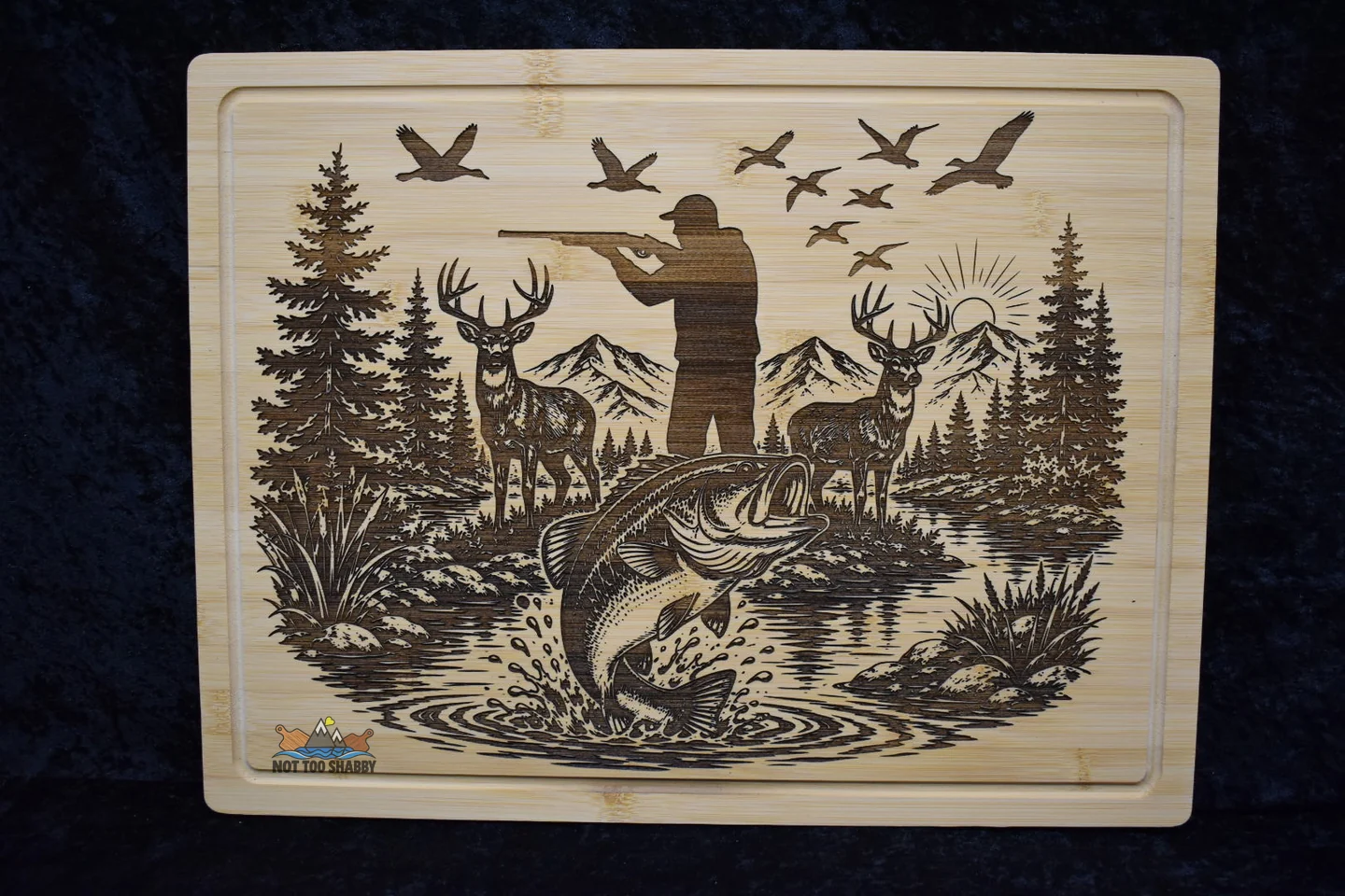 Hunting and fishing scene engraved on a cutting board