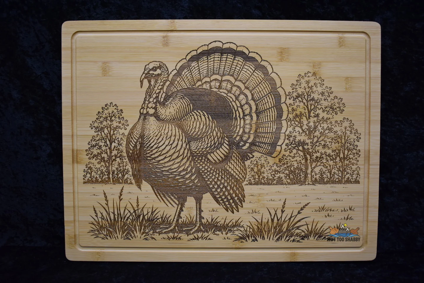 Wild turkey engraved on a bamboo cutting board