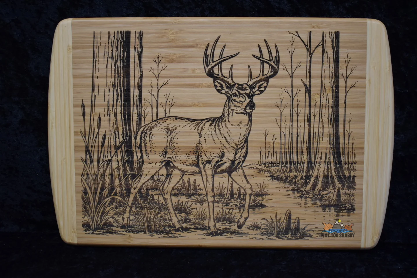 Whitetail deer engraved on a bamboo cutting board